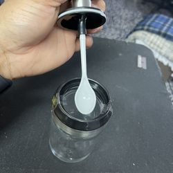 Container With Built In Spoon On Lid