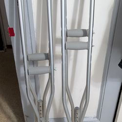 Two Pairs Of Crutches