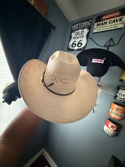 Twisted straw hat