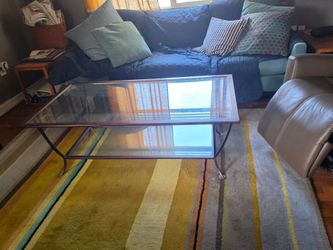 Glass coffee table. Very nice.