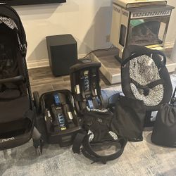 Nuna Stroller, Car Seat, 2 Bases For Car Seat, Baby Swing, And Matching Baby Carrier 