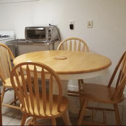 Solid Wooden Dining Room Table and Four Chairs