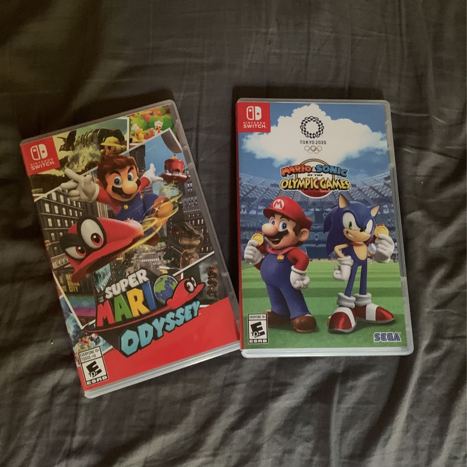 2 Nintendo switch games (Super Mario odyssey And Mario Vs. Sonic Olympics)