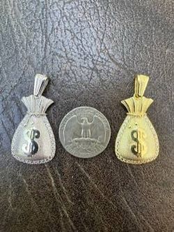Real nice money bag dollar sign gold and silver necklaces