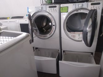 Kenmore front load washer and dryer set with pedestals in excellent conditions