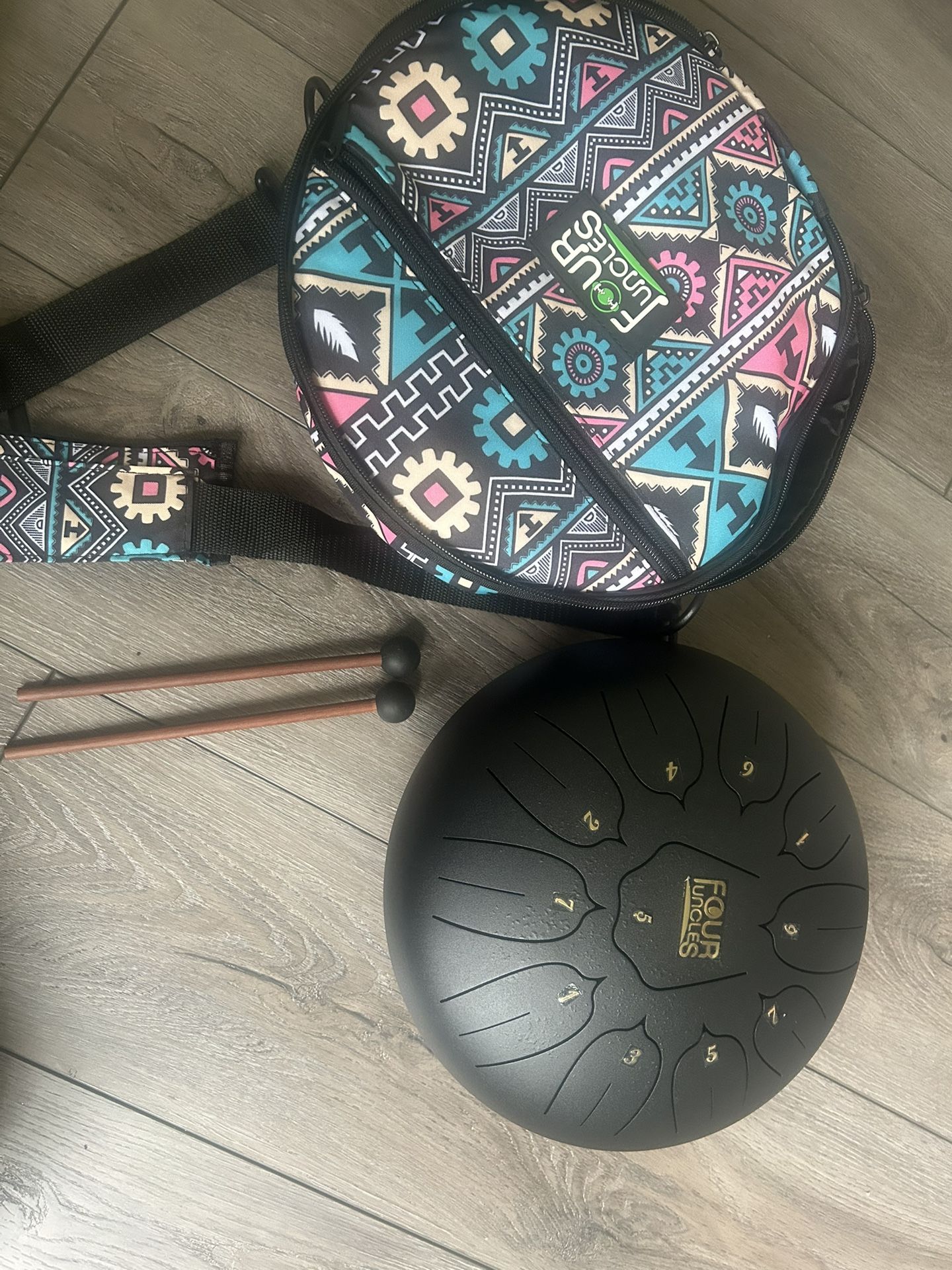 Four uncles steel tongue drum with travel bag and both mallets works perfectly and is super fun