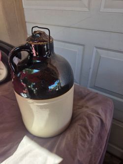 ceramic stoneware jug whiskey or moonshine.