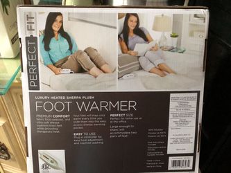 New in the box/ FOOT WARMER