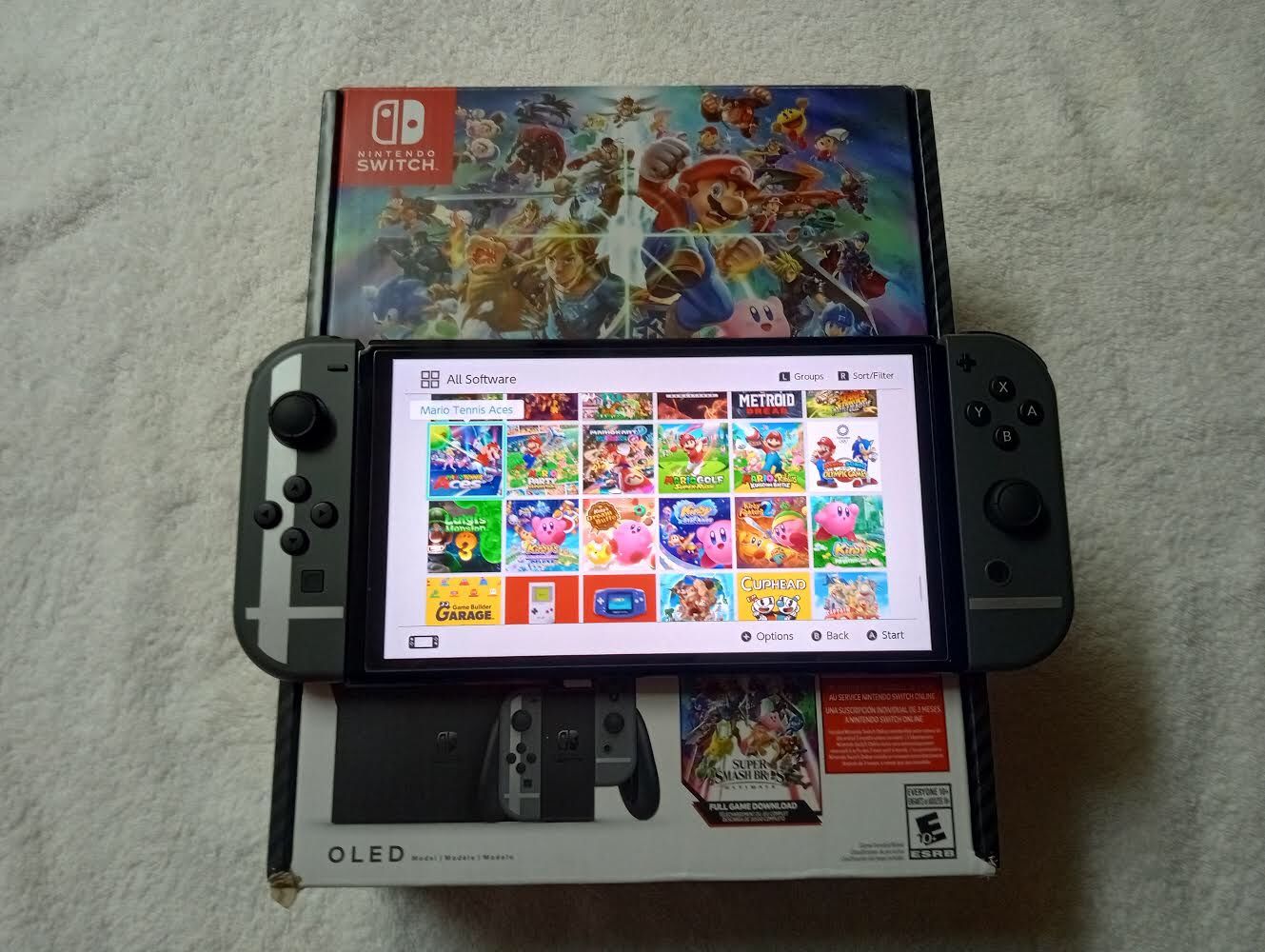 Nintendo Switch Oled With 100 Switch Games And 7500 Retro Arcade Games