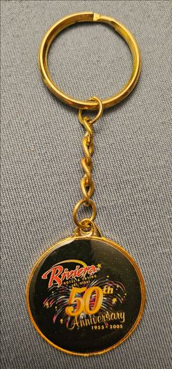 Riviera Las Vegas 50th Anniversary Keychain 1(contact info removed) Gold Black 3.5 Inches Long