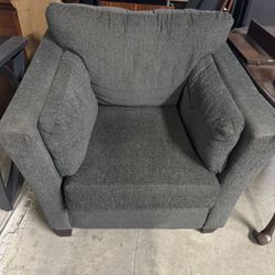  deep-seated armchair with cushioned arms and back