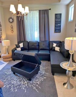 Black leather sectional couch