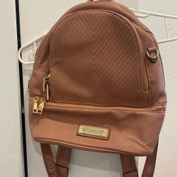 USED Andrew Marc Pink Backpack With Gold Accents