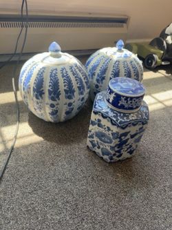 Blue and white ceramic jars with lids