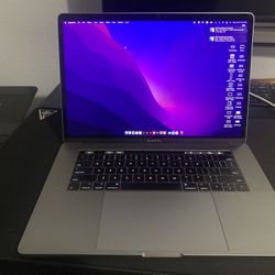 MacBook  Pro 15 Inch  Comes With Charger / Hard Case / USB Attachment