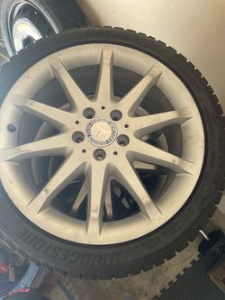 Set of 17-inch Mercedes-Benz wheels with brand-new tires.