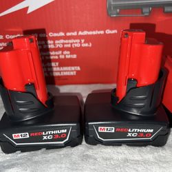 Milwaukee M12 Charger And Batteries And Caulking Gun