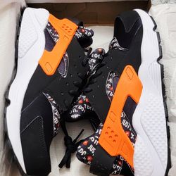 Size 10.5 Nike Air Huarache Just Do It AT5017-001.
