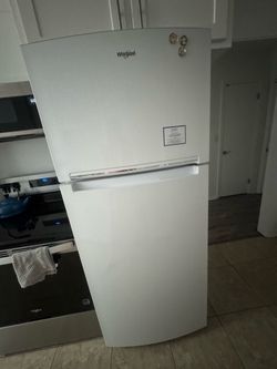 Whirlpool White Refrigerator with Top Freezer
