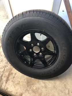 Goodyear tire and rim Chevy