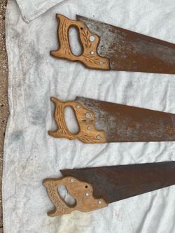 Antique saws, shovel & sharpener tool