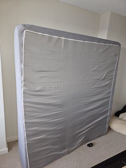 California king Bed frame and mattress.