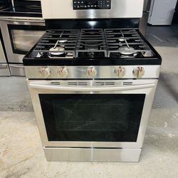 Samsung stainless steel stove, a receipt for a 90-day warranty