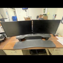 DELL (2) 28 inch monitors With Versa Desk