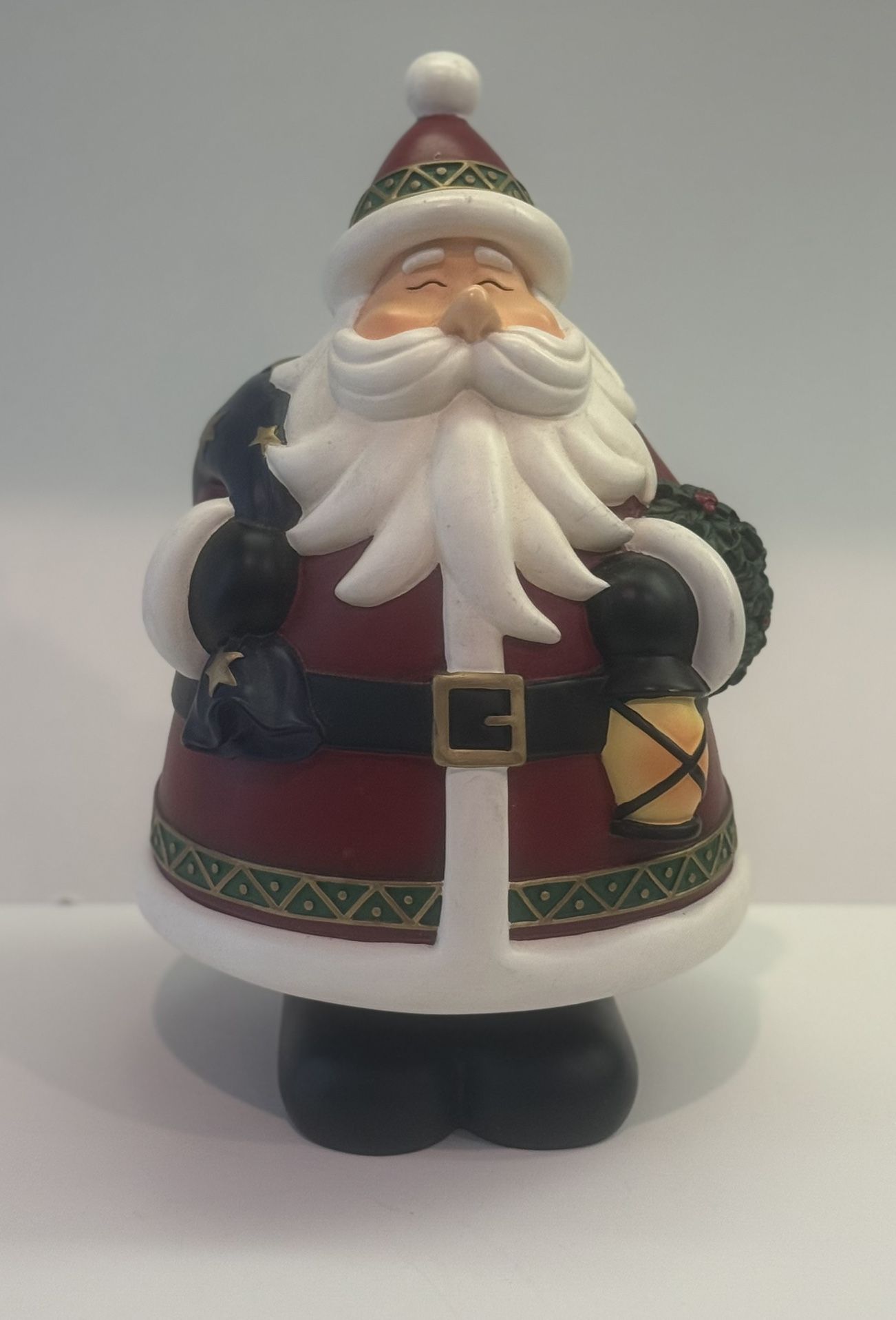 Vintage Decorative Santa from Costco w/ light & bag of presents 10"x 6"- Resin