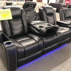 Ashley Power Reclining Sofa With adjustable headrests 