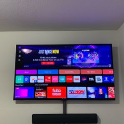 LG C2 TV 65 Inch EXCELLENT CONDITION STAND COMES WITH IT