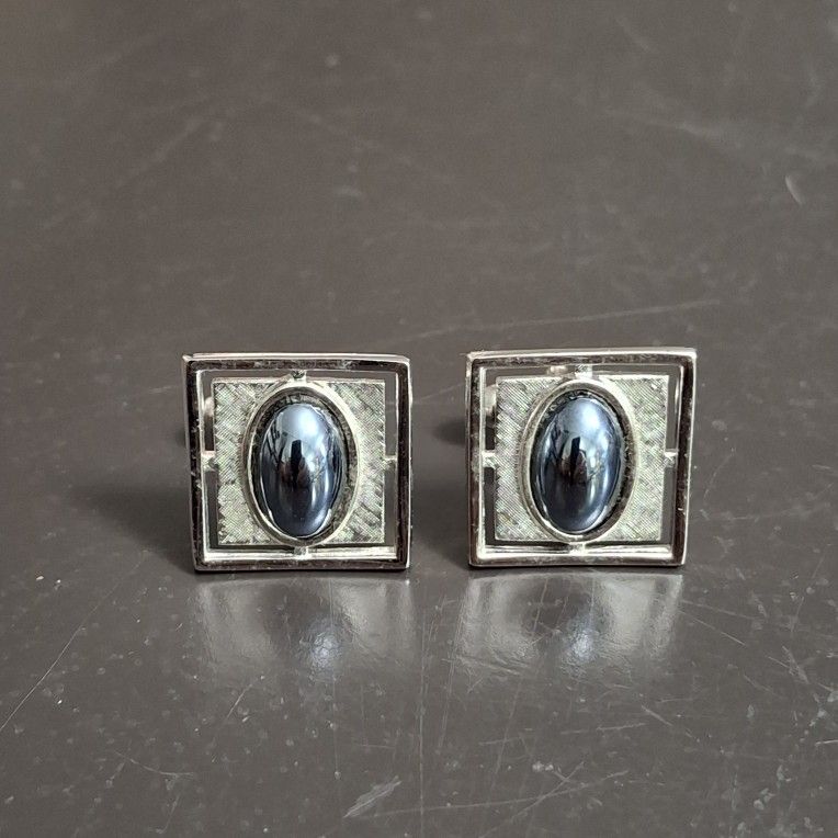 Vintage Anson Metallic Silvertone With Dark Blue Gray Polished Oval Gemstones Cuff Links