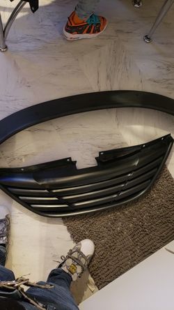 Flat black spoiler and grill for a 2011& up Hyundai sonata