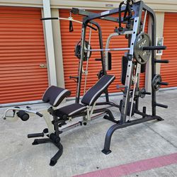 READ DESCRIPTION BELOW.  Marcy  MD-9010G  Smith Machine  Home Gym   w/  Weights  DELIVERY AVAIL. FIRM PRICE.