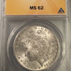 1884 cc Morgan Silver Dollar MS 62 ANACS