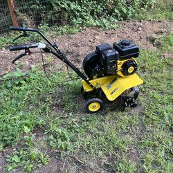 The Champion Power Equipment 19-Inch Rear Four Tine Tiller  - Open To Trade For Working Riding Lawn Mower 