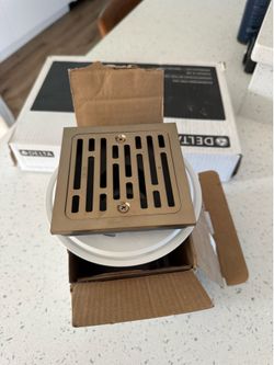 Brand New Gold Delta 4 inch Tile Drain