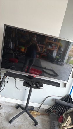 LG 55 Inch With Samsung Sound Bar.