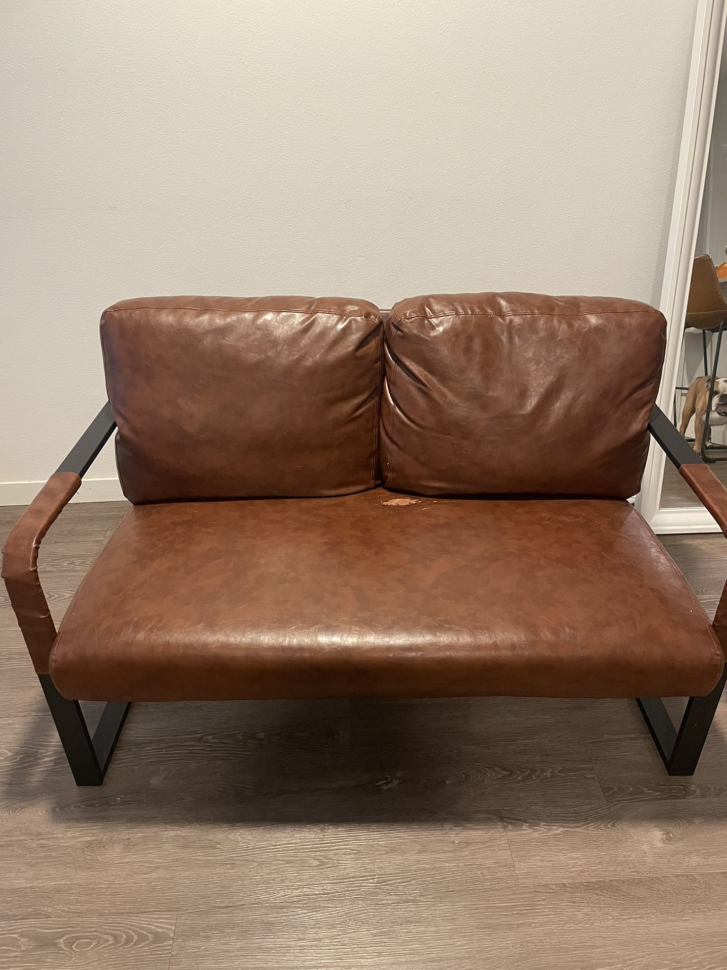 Faux leather love seat