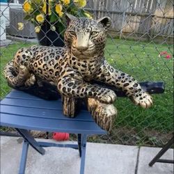 Golden Leopard On The Log Statue