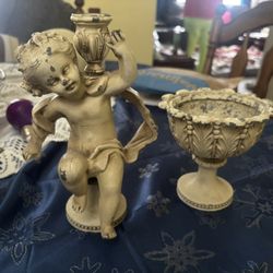 The angel Cherub Vintage Statues