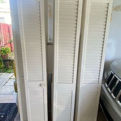 Louvered bifold wood doors
