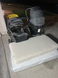 2 Strollers and 2 mattresses $150 for all