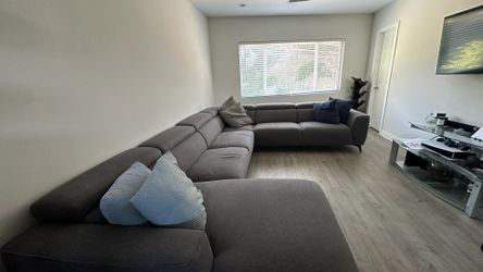 LivingSpaces 4 pc 8/9 person couch