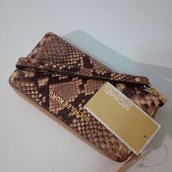 Women wallet , see photos for brand,size &measuremet cash only