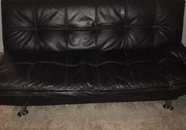 Leather couch/ sleeper