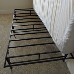 Twin size Metal frame, memory form mattress and two fitted Sheets. $50