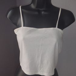 Pac Sun white ribbed cropped tank top size small 
58% polyester, 35% rayon & 7% spandex

Gray 2