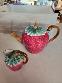 Vintage ceramic strawberry teapot and small matching pitcher