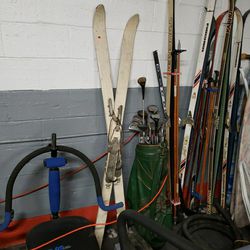 Vintage pair of skis being sold by the pair